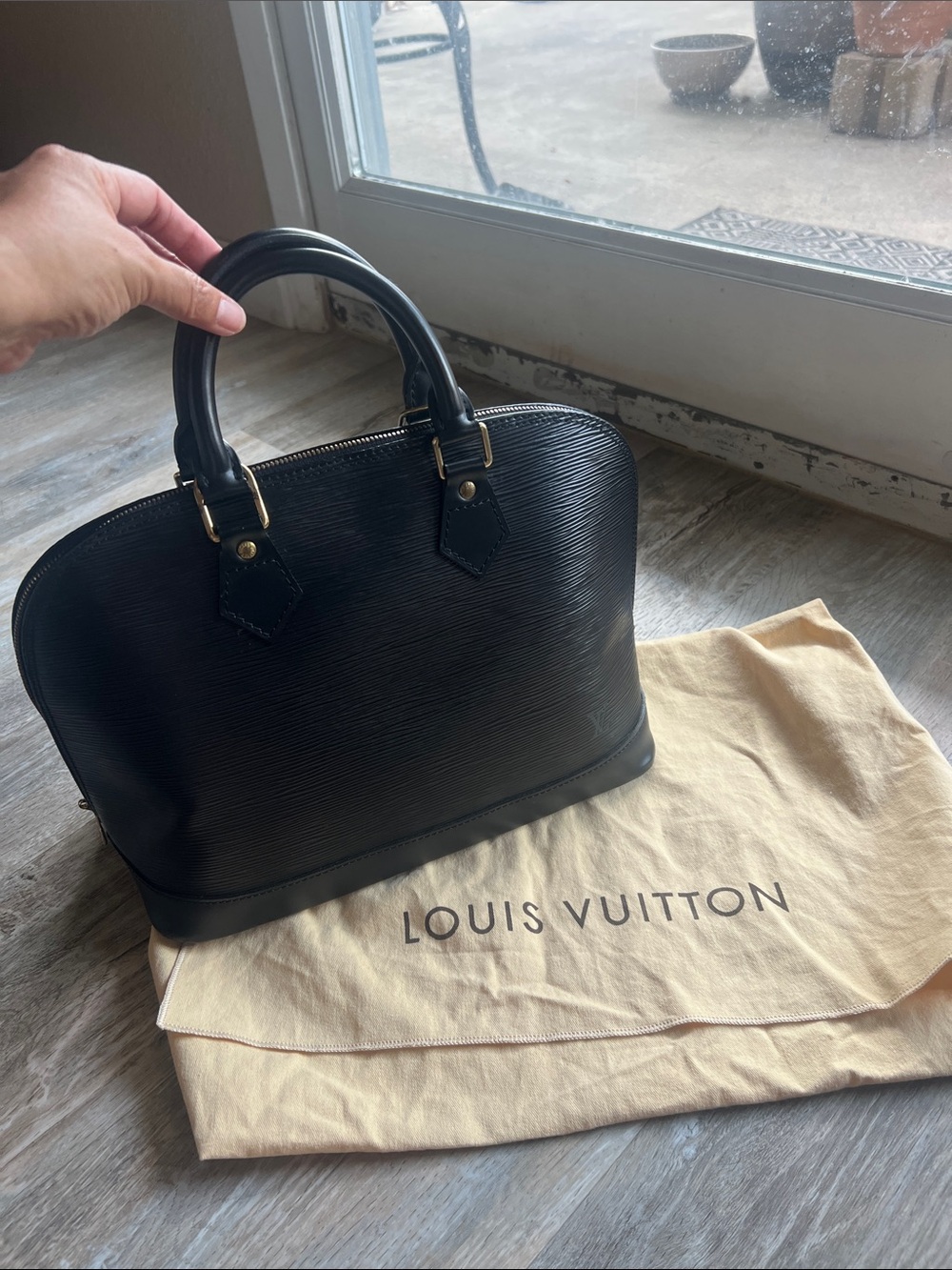 Louis Vuitton Black Epi Alma Satchel with Gold Hardware,in great condition